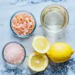 Pink Salt Recipe: 4-Ingredient Morning Trick 6 pink salt recipe ingredients laid out on a kitchen counter